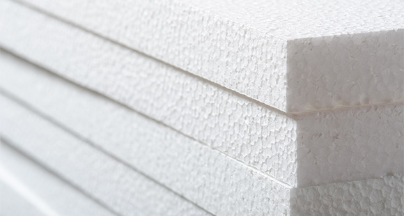 stack of white foam sheets showing textured surface and clean edges ideal for various crafting and construction projects